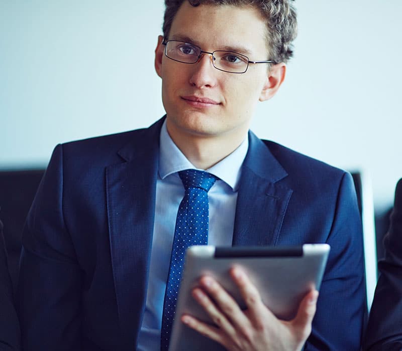 Lawyer at work with tablet device 